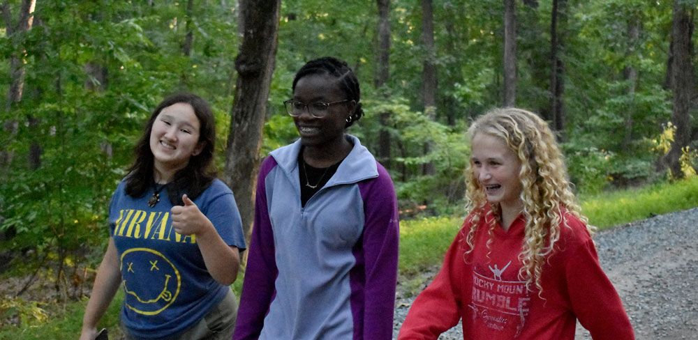 Students walking in the woods