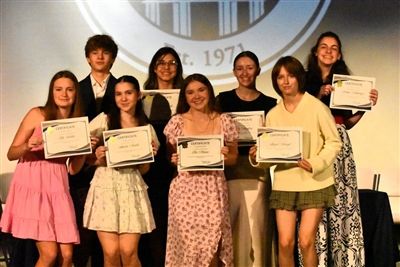 Eighth grade students were recognized for having attended O'Neal since PreKindergarten. (L-R) Front: Lily Austin, Amelia Neville, Ella Marino, Abigail Holroyd Back (L-R) Tyler Kuhn, Ava Bozovich, Isla Haughey, Adalyn Pohlmeyer